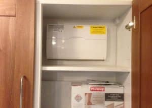 Consumer unit relocation into kitchen cupboard in Stevenage.